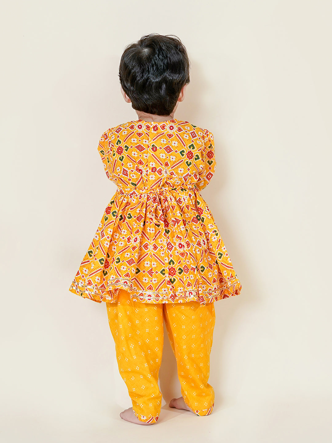 Festive Charm – Mustard Patola Kurti Dhoti Set for Baby Girls