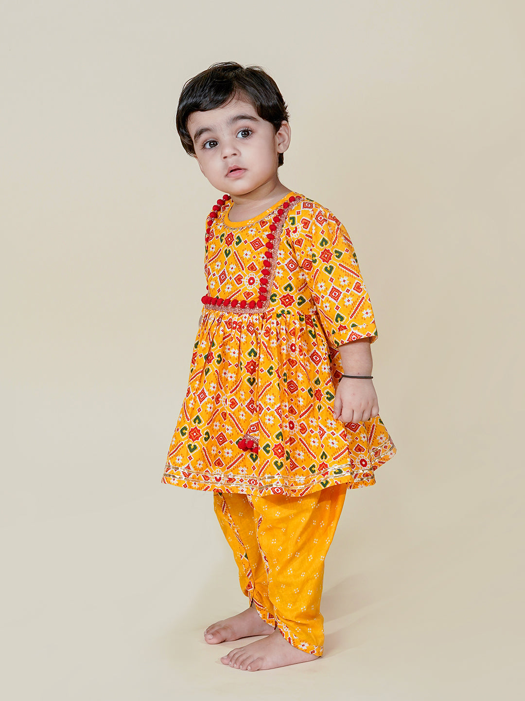 Festive Charm – Mustard Patola Kurti Dhoti Set for Baby Girls